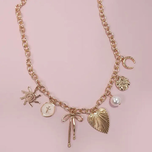 Sun Bow Pearl Cross Disc U Charm Necklace