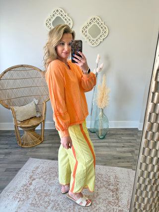 Citrus Exposed Seams Top